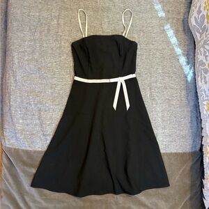 Elegant Black Dress with White Accents